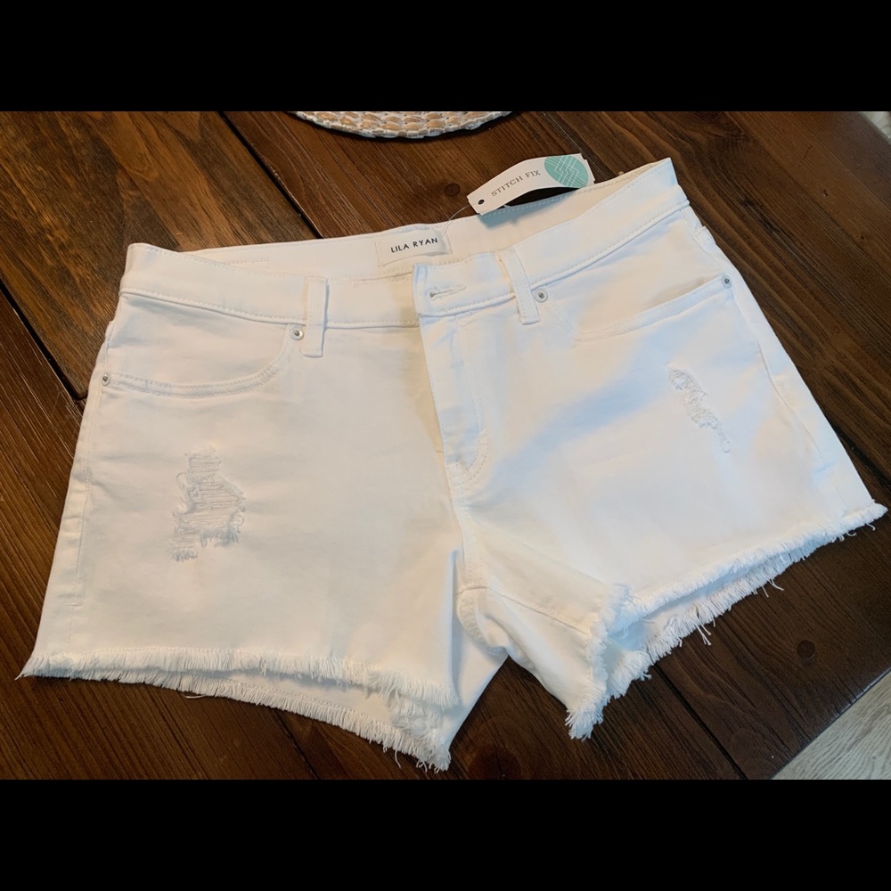 Lila Ryan white distressed shorts